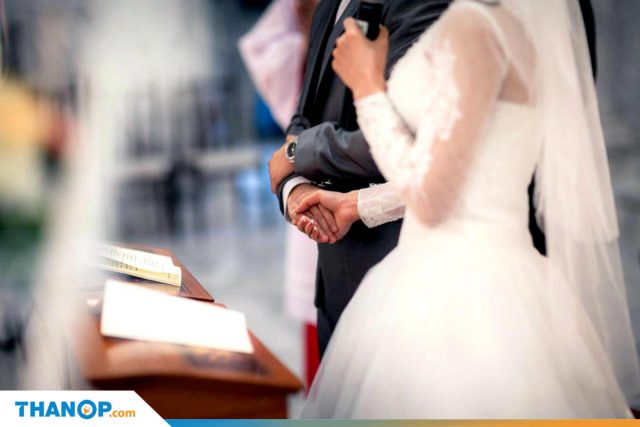 Marriage Certificate Article Wedding Ceremony in Church Holding Hands